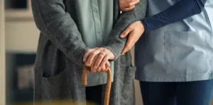 img-Industries-healthcare Caregiver assisting a senior resident